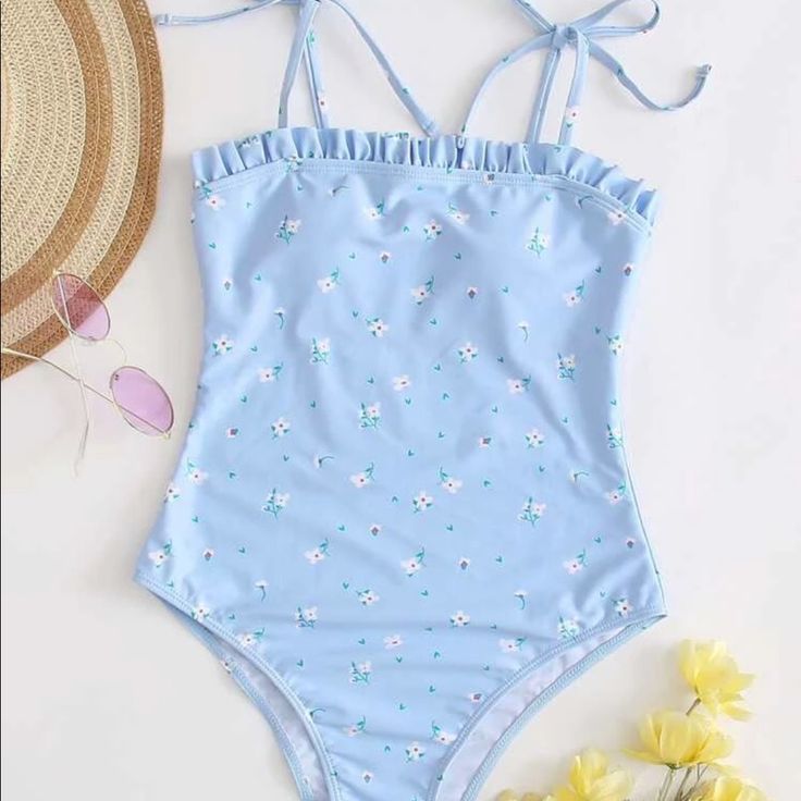 Brand New, Unworn Romwe Swimsuit Size Medium Blue Printed Summer Bodysuit, Casual Light Blue One-piece Swimwear, Summer Pool Bodysuit In Light Blue, Light Blue Summer Bodysuit For Pool, Light Blue Beachwear Bodysuit For Summer, Light Blue Sleeveless Swimwear For Spring, Blue Bodysuit For Beach Party In Spring, Light Blue Bodysuit For Summer Beach, Blue Bodysuit For Spring Beach Party