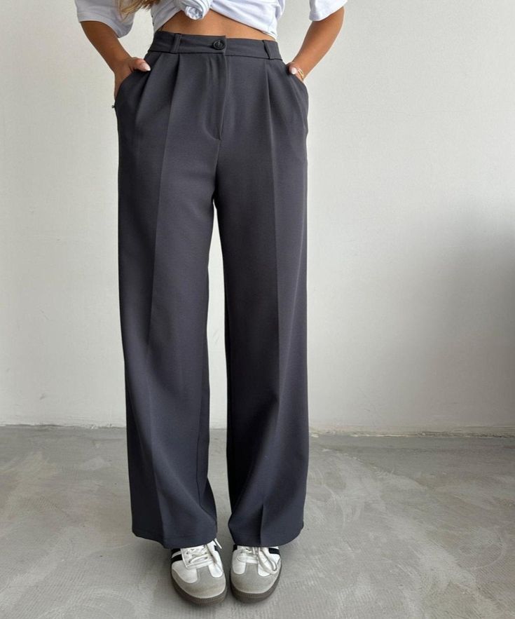 Introducing our Korean Wide Length Pants, perfect for both professional settings and casual wear. These pants feature a high-waisted design and a fluid wide-length silhouette that exemplifies modern elegance and comfort. Features: Material: Made with a smooth, high-quality fabric blend that offers both comfort and durability. Special Features: These pant come with a sleek, button closure and deep pockets for functionality without compromising style. Technical Specifications: Tailored to maintain Chic Gray Wide Leg Full Length Pants, Loosely Fitted Full Length Solid Dress Pants, Gray High-waist Office Pants, Gray High Waist Office Pants, Gray High Waist Pants For Office, Business Casual Wide Leg Leather Pants, Chic Wide Leg Full Length Pants, Chic Gray Wide-leg Pants, Versatile Formal Full Length Wide Leg Pants