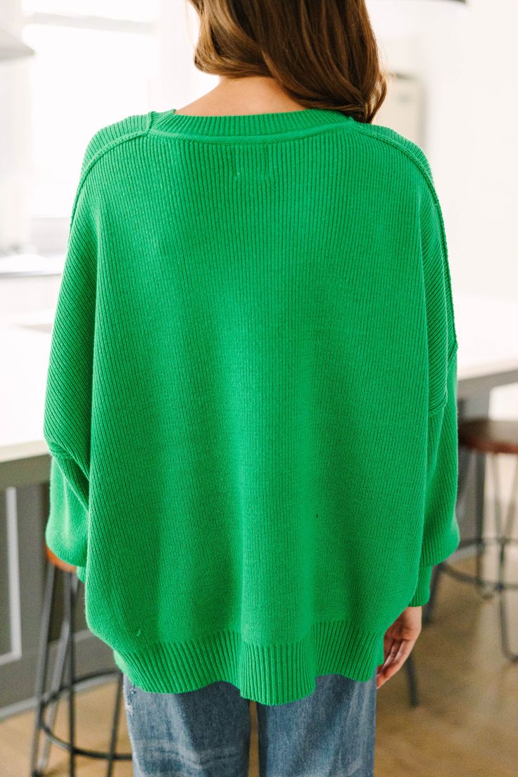 This oversized sweater is giving us all of the fall vibes! It's just so cozy and comfy! We think this is the perfect sweater for running errands, lounging around, or just any day of the week you want to be ultra comfy while still looking cute! This sweater features long dolman sleeves, round neckline, and an oversized fit. Material has a generous amount of stretch.Sydney is wearing the small. Oversized Knit Sweater For Loungewear, Casual Batwing Sleeve Sweater For Layering, Batwing Sleeve Sweater For Layering, Oversized Green Cropped Sweater For Spring, Cozy Cropped Sweater For Everyday Fall Use, Oversized Soft Knit Sweater With Batwing Sleeves, Cozy Slouchy Sweater With Ribbed Cuffs, Slouchy Cozy Sweater With Ribbed Cuffs, Comfortable Soft Knit Fall Sweater