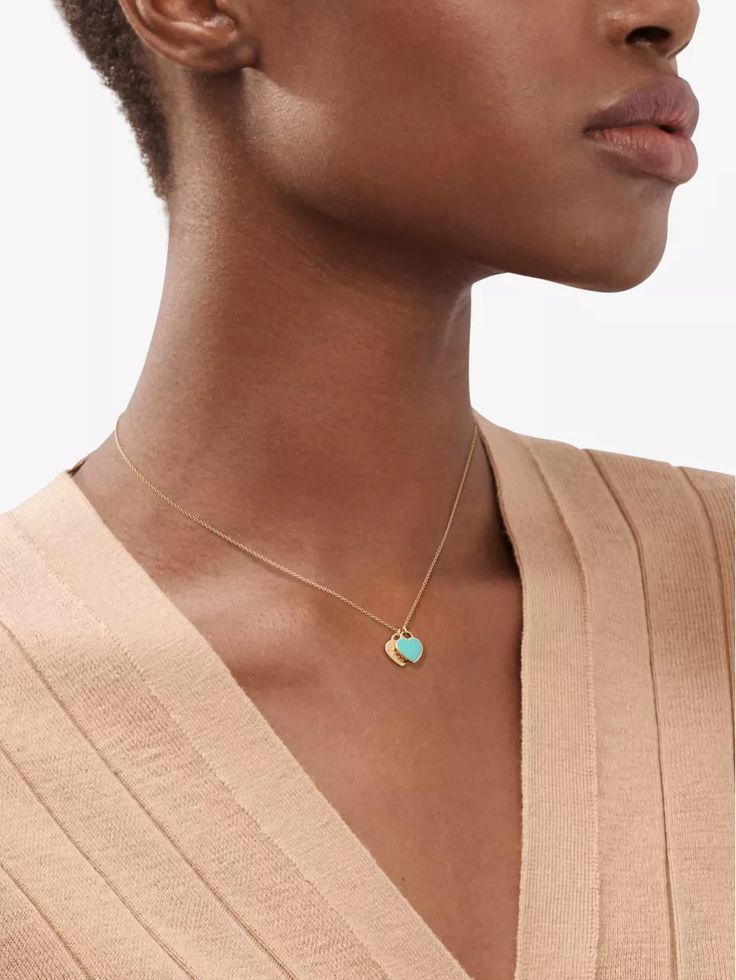 Tiffany & Co.’s Return to Tiffany collection is inspired by the jeweller's iconic key ring first introduced in '69. Now, for the Double Heart Tag pendant necklace, it’s reinvented, but once again with that telltale tag suspended from a polished 18-carat yellow-gold belcher chain. Rather than trek all the way to New York City and take in the city sights, we suggest you save those precious air miles and present it to someone you love and never look back. Return To Tiffany, Belcher Chain, Heart Tag, Never Look Back, Double Heart, The Double, Tiffany & Co., Key Rings, Key Ring