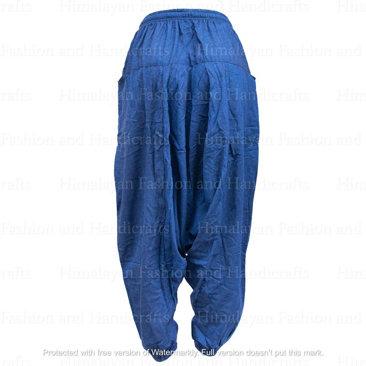 Nepal Yoga Harem Pants Handmade Cotton -Handmade in Nepal -100% Cotton -One Size -Adjustable Waistband with strings attached -2 Pockets on Right and Left Side -Low drop or Aladdin Crotch Return Policy: If you are not satisfied with your item, you must return your item in 7 days. After 7 days, there will be no refund. If you have any more questions, feel free to contact me. Please make sure to leave 5 stars and leave a good review! Stretch Cotton Harem Pants With Drawstring, Blue Stretch Cotton Harem Pants, Blue Cotton Harem Pants With Side Pockets, Cotton Yoga Bottoms With Drawstring, Loosely Fitted Cotton Harem Pants With Drawstring, Bohemian Blue Drawstring Bottoms, Blue Yoga Harem Pants With Pockets, Blue Harem Yoga Pants With Pockets, Yoga Harem Pants