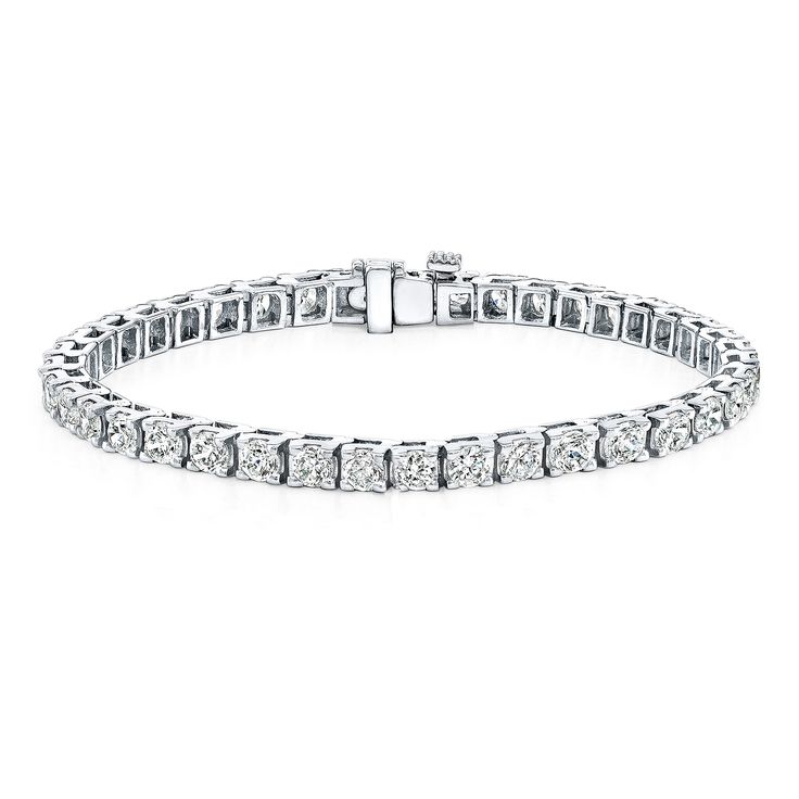 Classic tennis bracelet set in 14k white gold metal with a 4-prong setting with breathtaking round-cut diamond with a total weight of 10.00 ct. and 7 in length Black Diamond Pendant, Black Diamond Studs, Halo Diamond Earrings, Solitaire Diamond Pendant, Colored Diamond Rings, Diamond Tennis Bracelet, Halo Earrings, Black Diamond Ring, Gemstone Studs