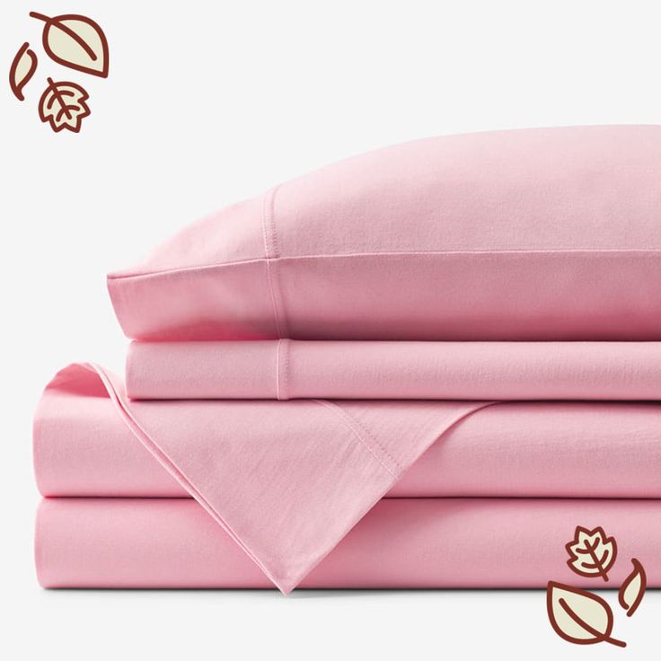 pink sheets and pillow cases with leaves on them