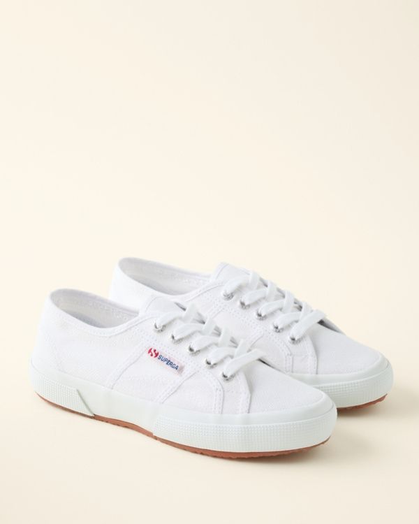 Superga 2750 Cotu Classic Sneaker White Cotton Canvas Shoes For Everyday, Everyday White Cotton Canvas Shoes, Cotton Sneakers With Rubber Sole, Cotton Everyday Sneakers For Spring, Classic Canvas Sneakers With Vulcanized Sole, Everyday Cotton Sneakers For Spring, Cotton Sneakers For Everyday Spring Wear, Everyday Canvas Shoes With Vulcanized Sole, Classic Sneakers With Gum Sole For Spring