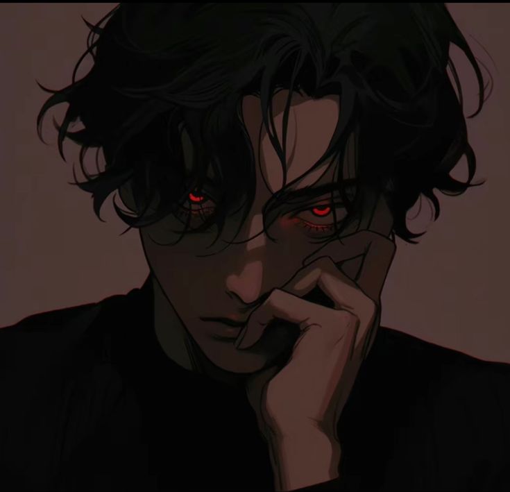 a man with dark hair and red eyes stares at the camera while holding his hand to his face