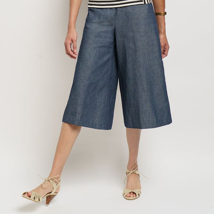 Our denim culottes are a study in proportion: they sit high on the natural waistline, fall below the knees, and have the most flattering wide legs. With every wash and wear, the dark denim will soften more and more. Extra credit goes towards the slant pockets and flat-front waistband with elastic back. Versatile Medium Wash Bottoms For Day Out, Mid-rise Wide Leg Pants For Summer, Modern Bottoms With Pockets For Spring, Modern Spring Bottoms With Pockets, Versatile Cropped Wide Leg Summer Pants, Spring Cropped Wide Leg Pants In Dark Wash, Spring Dark Wash Cropped Wide Leg Pants, Modern Cropped Leg Bottoms For Spring, Modern Cropped Leg Bottoms With Relaxed Fit