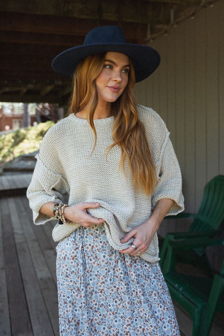 Snuggle up in a chunky boho sweater like the Crisp Air pullover. Thick, seam detailing and a fun double - hem has a bit of open - stitch detail at the notches in the sides. This modern, boxy - fit has wide cuffs and comfy Dolman - style sleeves. Pair with: Evermore Seamless Lace Racerback Bralette, Washed Ashore Ruffled Maxi Skirt and Dreamscape Layered Necklace. *Due to lighting and differences in monitors, actual colors may vary slightly from what appears online. Model is 5'8" and wearing a si Ruffled Maxi Skirt, Washed Ashore, Floral Cuff, Ruffle Maxi Skirt, Boho Sweater, Crisp Air, Wide Cuff, Long Sleeve Knit Tops, Beige Sweater