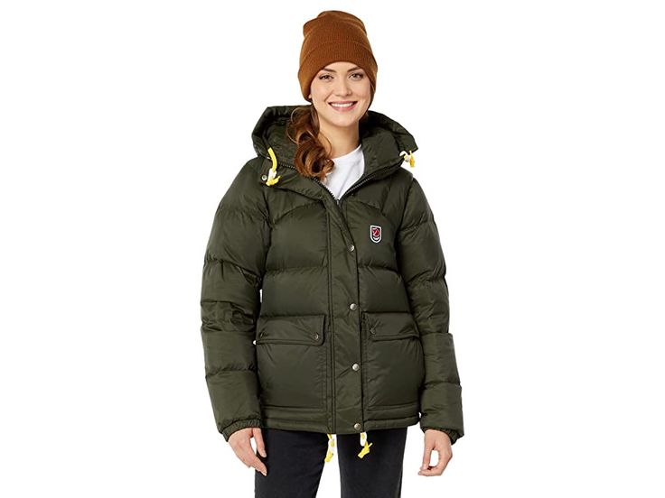 Fjallraven Expedition Down Lite Jacket - Women's Coat : Deep Forest : Enjoy the outdoors in the Fjällräven Expedition Down Lite Jacket. With its lightweight material, it is the perfect must-have for milder winter climates. Shoulders are reinforced with synthetic padding to prevent moisture and pressure. Outer fabric in hardwearing polyamide with PFC-free DWR (durable water repellent) Wind resistant, water-resistant. Snap-flap hand pockets with vertical zips. Inner stash pockets. Adjustable drawc Long Sleeve Hooded Jacket For Winter Camping, Hooded Fall Outerwear For Camping, Hooded Outerwear For Fall Camping, Casual Winter Camping Hooded Jacket, Fall Camping Hooded Jacket With Long Sleeves, Casual Winter Hooded Jacket For Camping, Long Sleeve Hooded Jacket For Fall Camping, Winter Camping Long Sleeve Outerwear, Winter Camping Outerwear With Pockets