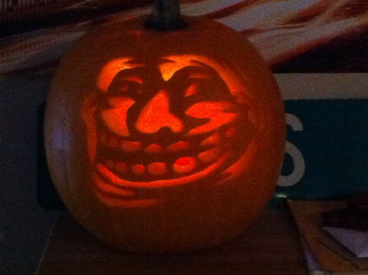 a carved pumpkin sitting on top of a table