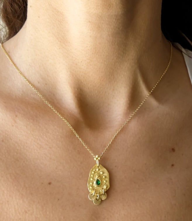 Boho gold necklace 9k 14 k Solid gold necklace with green emerald May birthstone, Yellow gold necklace, Delicate Pendant, Gift for her This solid gold necklace has a rustic textured and is set with a natural green emerald. The pendant has a delicate granulation all around it. This pendant is delicate but has a lot of character, and will upgrade any outfit you'll wear, for everyday use, as for special occasions The pendant can be ordered without the chain too. An excellent choice for anniversary Fine Jewelry Gold Emerald Necklace With Delicate Chain, Gold Emerald Necklace With Delicate Chain, Fine Jewelry, Emerald Necklace With Delicate Chain For Gift, Emerald Necklace With Delicate Chain As Gift, Emerald Necklace With Delicate Chain For May Birthstone, May Birthstone Emerald Necklace With Delicate Chain, Dainty Gold Emerald Birthstone Necklace, Fine Jewelry Emerald Necklace In Gold, Dainty Emerald Pendant Necklace With Delicate Chain