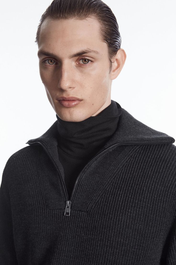 This modern jumper is expertly knitted from a blend of RWS wool and cotton that's weighty and warm. Offered in versatile black, it's shaped for a relaxed fit and designed with a foldover half-zip collar, which can be worn fastened up or slightly open to show your T-shirt underneath.  Relaxed fitSlightly dropped shouldersCertified according to the Responsible Wool Standard, to protect the welfare of the sheep and their environment 65% RWS Wool, 35% Cotton / Machine wash Back length of size M is 6 Gray Half-zip Sweater For Fall, Gray Half-zip Fall Sweater, Gray Half-zip Winter Sweater, Wool Half-zip Sweater With Ribbed Collar, Merino Wool Funnel Neck Polo Sweater, Modern Half-zip Tops For Fall, Wool Half-zip Sweater With Ribbed Cuffs, Half-zip Polo Sweater With Ribbed Cuffs For Winter, Wool Half-zip Polo Sweater