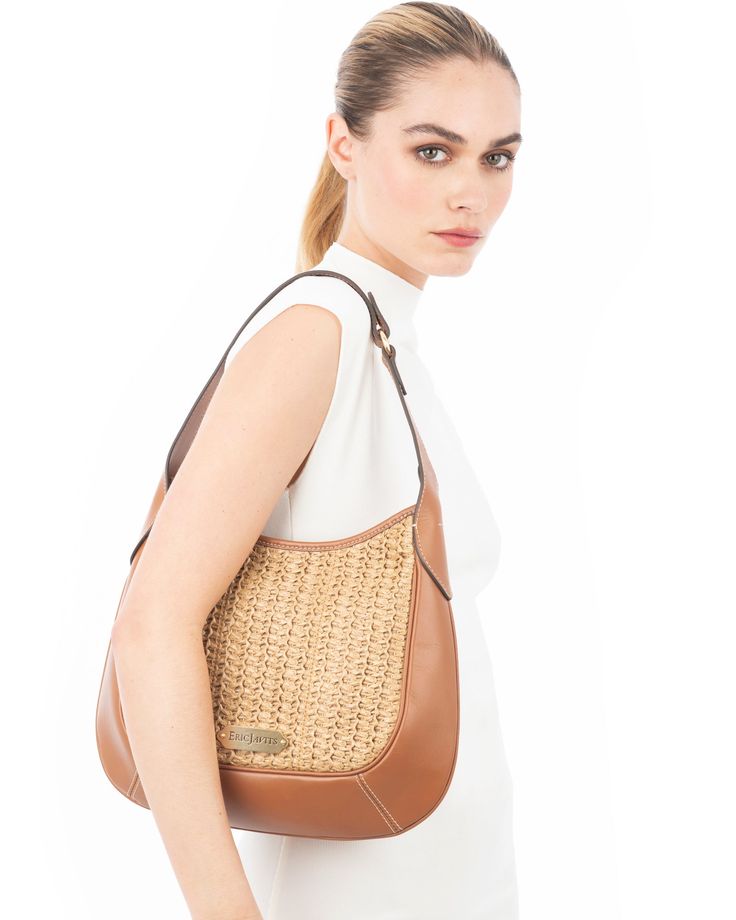 Mid-size women’s hobo bag for sale on line, with classic streamlined proportions is versatile and chic! The body construction is soft, contrast textures feel like summer, while handle length options provide versatile end use. Crochet raffia center panels are framed with a soft napa leather gusset and welt seaming. The recessed top zipper closure secures the bag’s contents. Island’s profile is slim and always feels comfortable, whether worn tucked snugly under the arm or when attaching the handle Elegant Hobo Bag With Braided Handles, Chic Leather Baguette Bag With Handles, Leather Hobo Bag With Leather Trim For Errands, Elegant Beige Hobo Bag With Braided Handles, Shopping Baguette Bag With Braided Double Handles, Elegant Tote Baguette Bag With Braided Handles, Chic Bucket Bag With Leather Trim, Chic Bucket Bag With Leather Trim And Top Handle, Chic Travel Baguette Bag With Braided Handles