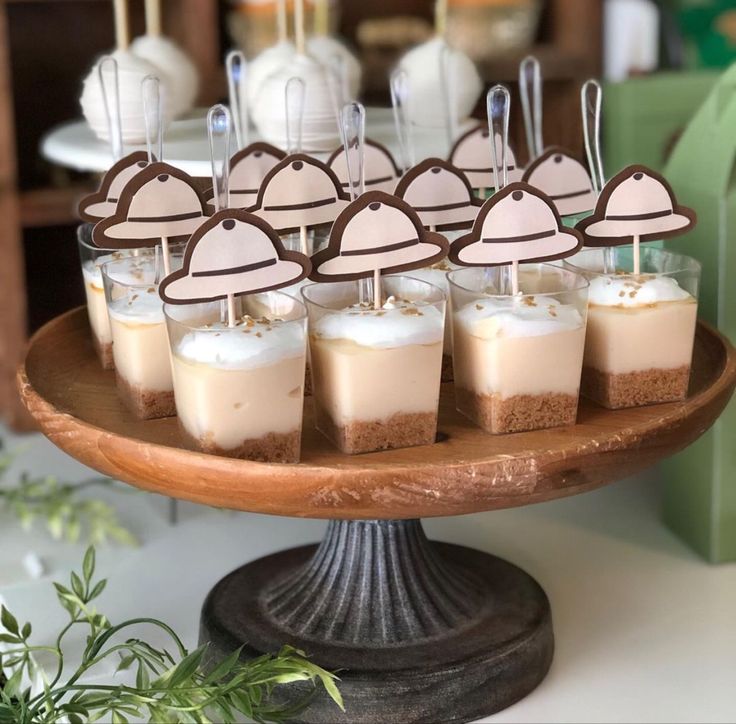 small desserts are arranged on a cake plate