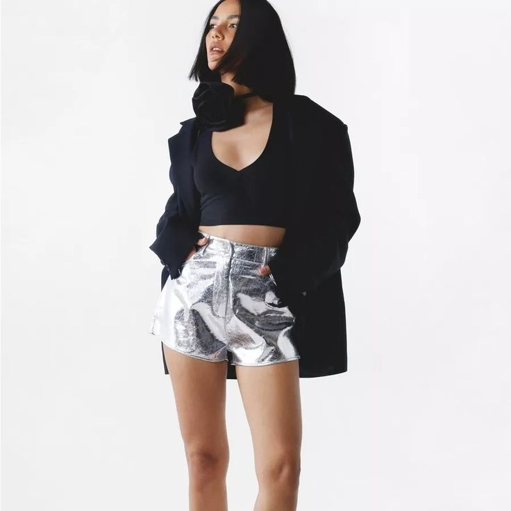 Let Your Legs Out. Feel Fierce In Our Shorts, Made In High Quality Faux Leather Fabric, With A Unique Metallic Colorway And A Flattering High Waistline. Style With A Bralette Or Crop Top And Chunky Boots For A Look That Will Take You From Nights Out To Festivals And Gig Nights. Crackle Faux Leather Shorts High Quality Faux Leather Stellar Fitted Silhouette Unique Metallic Colorway Flattering High Waistline Pocket Features Model Wears A Size M (Us Size 6/Uk Size 10). 100% Polyurethane: Wipe Clean Trendy Short Length Club Bottoms, Trendy Club Shorts In Short Length, Fitted Party Shorts With Pockets, High-waisted Party Shorts With Pockets, Trendy Party Shorts For Fall, Trendy Fall Party Shorts, Edgy Club Shorts For Spring, Chic Club Bottoms Short Length, Chic Short Bottoms For Club