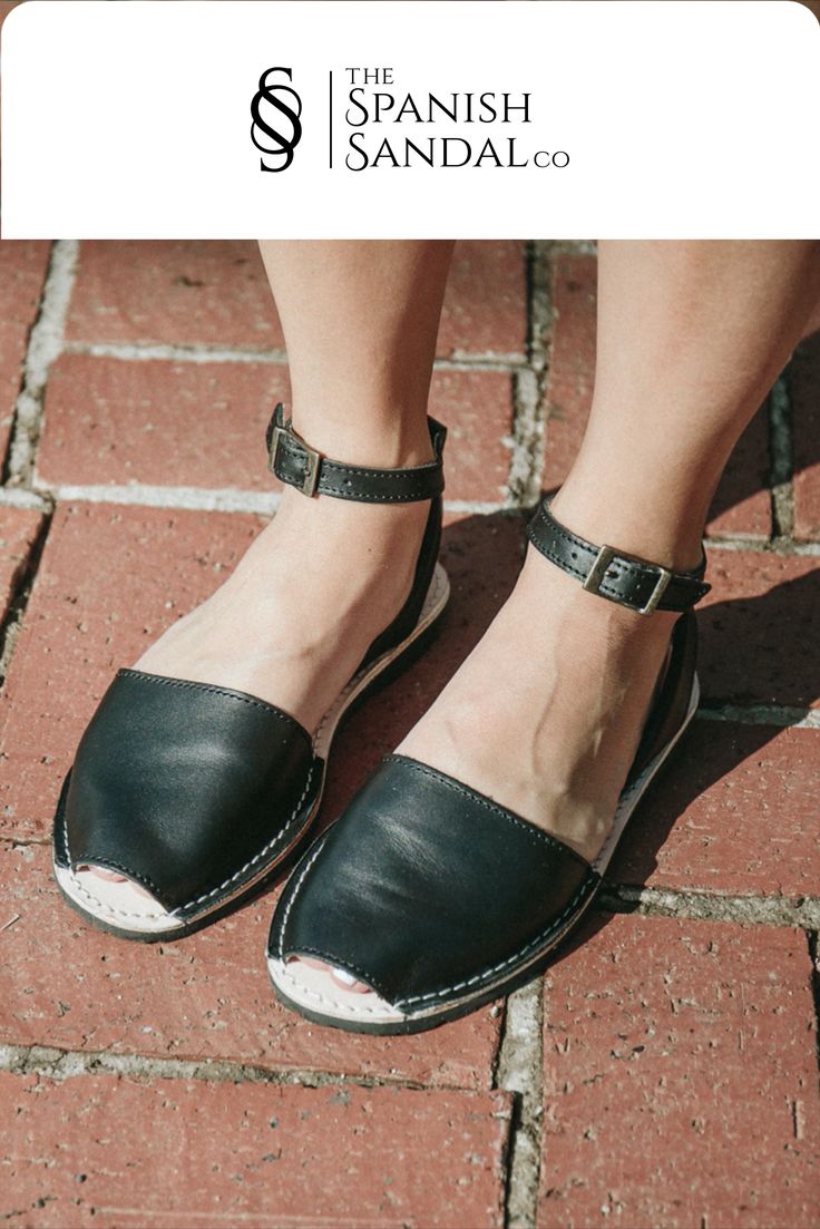 Our classic style sandal with a detachable ankle strap. They are made with black Napa leather and the outsoles are made with rubber.  #anklestrap #flats #sandals #leather #black #avarca #weekendstyle #comfyshoes #casualfriday #spanishsandal #slipon #wedges Summer Ankle Strap Flats With Buckle Closure, Chic Flat Slingback Sandals For Everyday, Casual Ankle Strap Flats With Removable Insole, Chic Everyday Sandals With Leather Footbed, Spring Open Toe Everyday Flats, Spring Everyday Open Toe Flats, Flat Sandals With Buckle Closure For Everyday, Chic Summer Flats With Ankle Strap, Chic Ankle Strap Flats For Summer