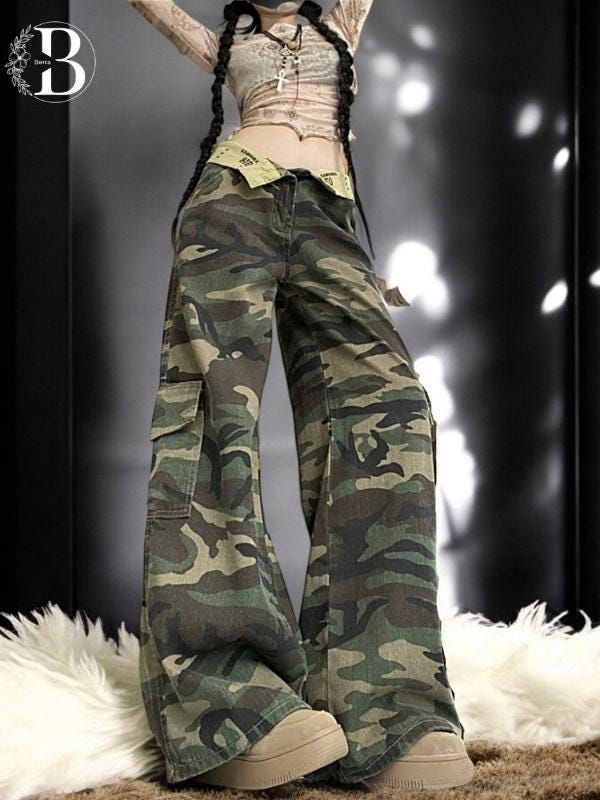 Wide Leg Cargo Pants for Women--High Waist Military Style Pants Upgrade your streetwear look with these high-rise camouflage wide-leg cargo pants for women. Featuring a classic camouflage pattern, these military-style pants are both functional and stylish. With large cargo pockets and a relaxed, loose fit, they offer comfort without compromising on style. Whether you're dressing for a casual day or looking to make a bold fashion statement, these pants are the perfect choice. Designed for versati Alt Style Outfit, Cargo Pants For Women, Cargo Hose, Wide Leg Cargo Pants, Camouflage Outfits, Khaki Cargo Pants, Camouflage Pants, Womens Trousers, Pants With Pockets