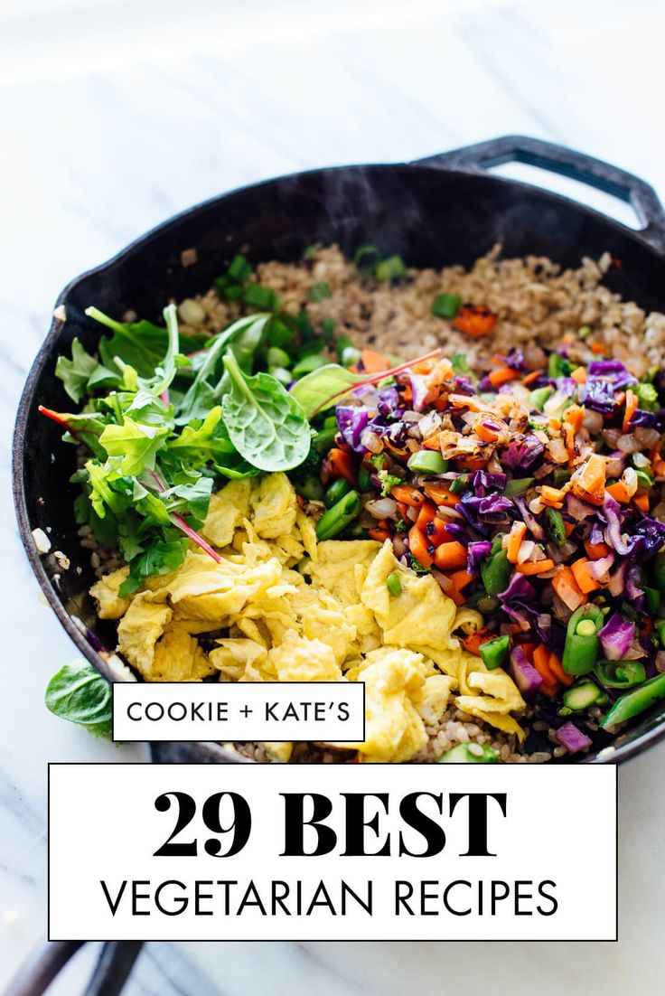 a skillet filled with vegetables and rice on top of a white table next to the words 29 best vegetarian recipes