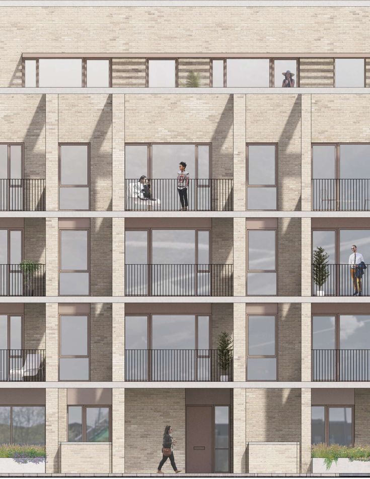 two people are standing on the balconies of an apartment building while another person walks by