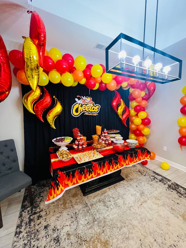 a birthday party with balloons and decorations