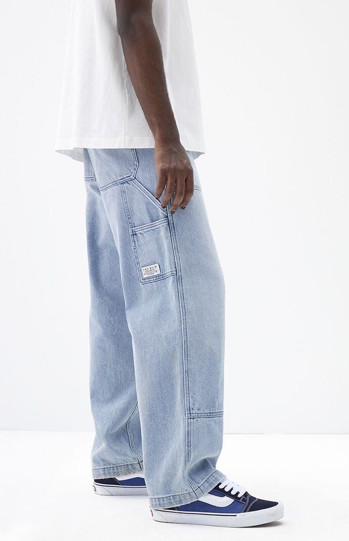 Experience comfort and utility in the PacSun Light Indigo Baggy Carpenter Jeans. These jeans feature a classic relaxed fit with a wide leg and panel detailing on the front, complemented by a clean light indigo wash. With utility details including a woven tag with branded genuine goods tag, tool pocket, and hammer loop detail, they blend practicality with timeless style for a versatile wardrobe staple.Model is wearing a size 32Model Measurements: 6'1” Height, 31” Waist, 32” InseamLearn more about PacSun eco items PacSun Mens Light Indigo Baggy Carpenter Jeans - Blue size 30W 30L Skater Style Men, 90s Skater Fashion, Lau Lau, Baggy Carpenter Jeans, Fire Clothes, Baggy Jeans Outfit, Pacsun Mens, Jeans Outfit Men, Denim Pants Mens