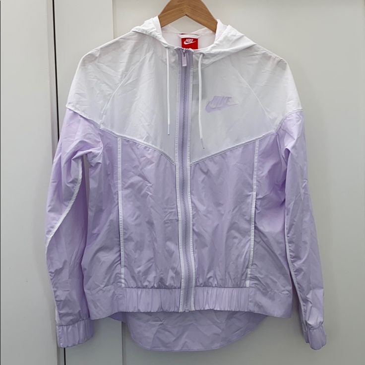 Brand New Women’s Windrunner Jacket With Hood Lavender/ White Check Out My Page For Other Sizes And Styles White Athleisure Windbreaker For Light Sports, White Casual Windbreaker For Light Sports, White Windbreaker For Light Sports In Winter, Winter White Windbreaker For Light Sports, White Winter Windbreaker For Light Sports, Nike Sportswear Spring Windbreaker, White Nylon Outerwear For Light Sports, Nike Spring Windbreaker In Athleisure Style, Functional Nike Windbreaker For Spring