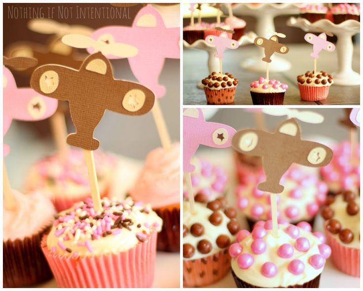 some cupcakes are decorated with pink and brown icing as well as an airplane