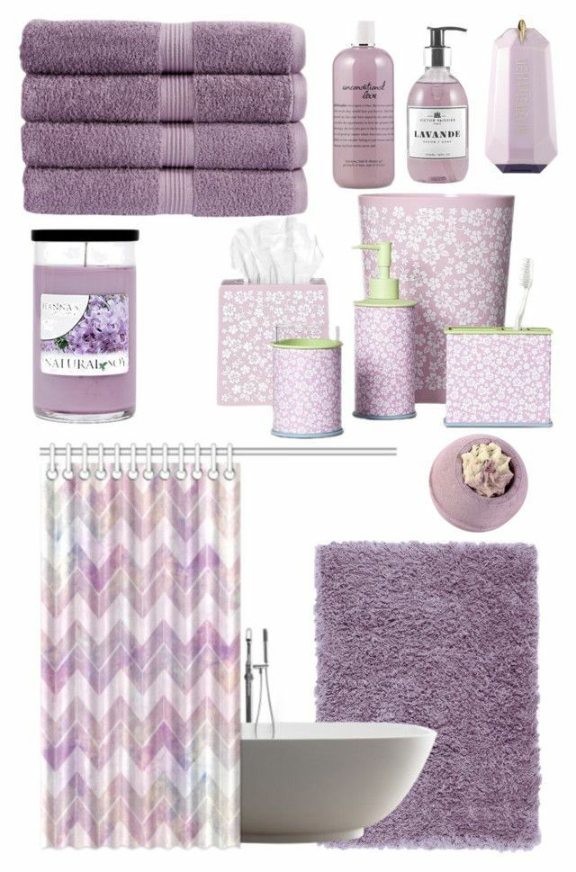 a bathroom with purple towels, bath accessories and other items in it's display