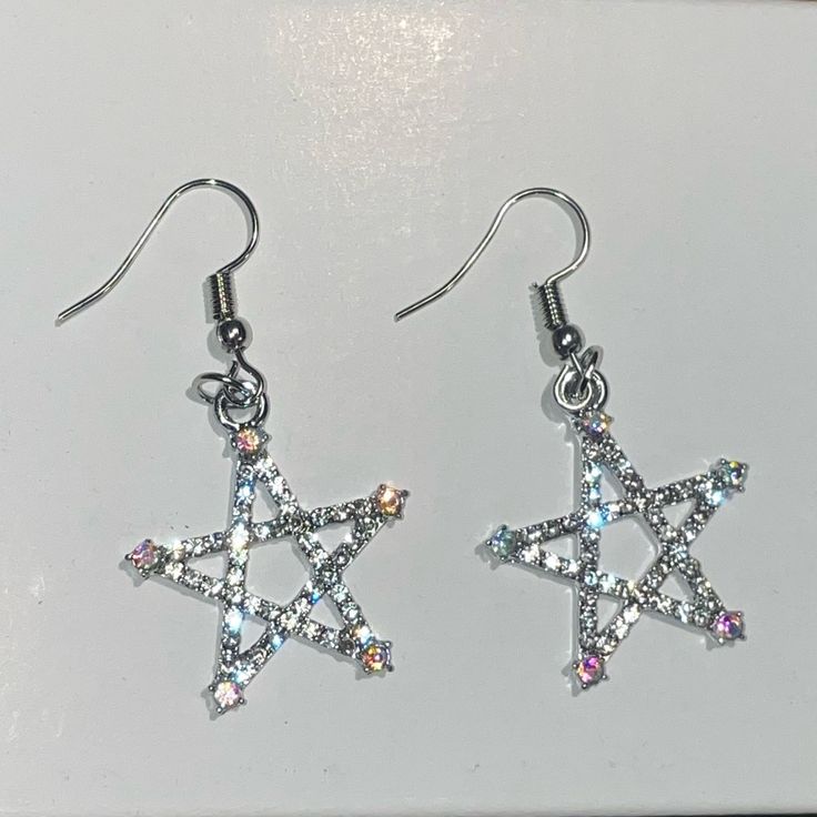 Sparkle Star Silver Earrings 1 Pair Star Earrings Condition: New Size: Star About 2cm X 2.5cm - Sparkle Star Earrings - Great For Any Occasions No Brand/Unbranded Any Question Please Ask Before Purchase Free Gift On Order Over $100 Before Shipping Open For Reasonable Offer Bundle To Save On Shipping, Message Me Discount On Bundle Party Earrings With Star Charm In Metal, Party Earrings With Star Charm, Party Metal Earrings With Star Charm, Sparkling Star Crystal Earrings For Party, Sparkling Star-shaped Crystal Earrings For Party, Star-shaped Crystal Earrings For Gifts, Nickel-free Star Jewelry For Parties, Star-shaped Metal Earrings For Party, Star-shaped Party Earrings With Ear Wire