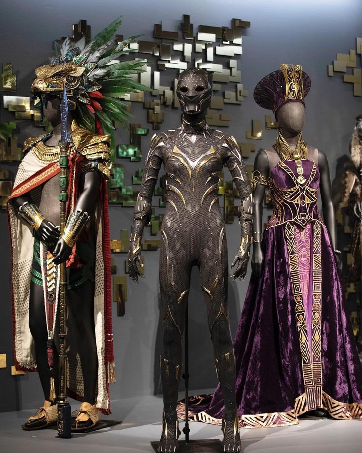 three mannequins dressed in african costumes