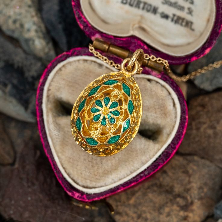 This lovely pendant necklace features a filigree gold egg pendant with green enamel details. The slide pendant hangs from an 18 inch long chain and both are crafted in 14k yellow gold. Gold Necklace Vintage, Gold Egg, Vintage Antique Jewelry, Green Enamel, Long Chain, Estate Jewelry, Antique Jewelry, Vintage Jewelry, Egg