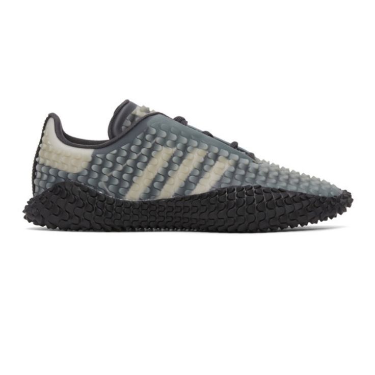 Low-Top Textured Rubber Sneakers In Grey And Black. Round Toe. Textile Underlay In Black Throughout. Tonal Lace-Up Closure. Signature Stripes In White At Sides. Black Rubberized Strip Featuring Logo Embossed In White At Heel Counter. Textile Heel Tab In White. Padded Collar. Bonded Jersey Lining In Black. Sculptural Rubber Sole In Black.Part Of The Craig Green X Adidas Collaboration.Supplier Color: Carbon/White Sku: 201735m237042 Gender: Mens Excellent Preowned Condition Awesome Pair Of Sneakers One Of A Kind Exclusive Collaboration With Ceaig Green Size 12 Gray Leather Running Shoes With Translucent Outsole, Gray Running Shoes With Rubber Waffle Outsoles For Streetwear, Adidas Sporty Sneakers With Textured Sole, Gray Mesh Sneakers With Rubber Sole, Black Sneakers With Textured Sole For Jogging, Sporty Gray Sneakers With Rubber Waffle Outsoles, Dynamic Adidas Sneakers With Rubber Sole, Adidas Dynamic Sneakers With Rubber Sole, Adidas Running Sneakers With Rubber Waffle Outsoles