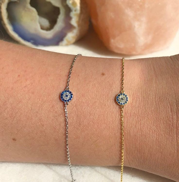 Beautifully light Sterling Silver chain bracelet with Cubic Zirconia Evil Eye charm; adjustable in length up to 7.5 inches  adjustable between 16 - 19.5cm in length  This bracelet is perfect for gifting with our matching necklace & stud earrings also available: Necklace: https://www.etsy.com/uk/listing/727886349/sterling-silver-evil-eye-necklace?ga_search_query=Evil%2Beye&ref=shop_items_search_5 Earrings: https://www.etsy.com/uk/listing/826524760/sterling-silver-evil-eye-earrings?ga_search_query Silver Bracelets Evil Eye, Trendy Gift Jewelry In Cubic Zirconia, Dainty Resizable Jewelry For Friendship, Dainty Adjustable Jewelry As Gift, Dainty Adjustable Jewelry For Gifts, Dainty Adjustable Length Jewelry For Gifts, Adjustable Tarnish Resistant Jewelry Gift, Trendy Charm Bracelet With Delicate Chain, Trendy Adjustable Charm Bracelet With Delicate Chain