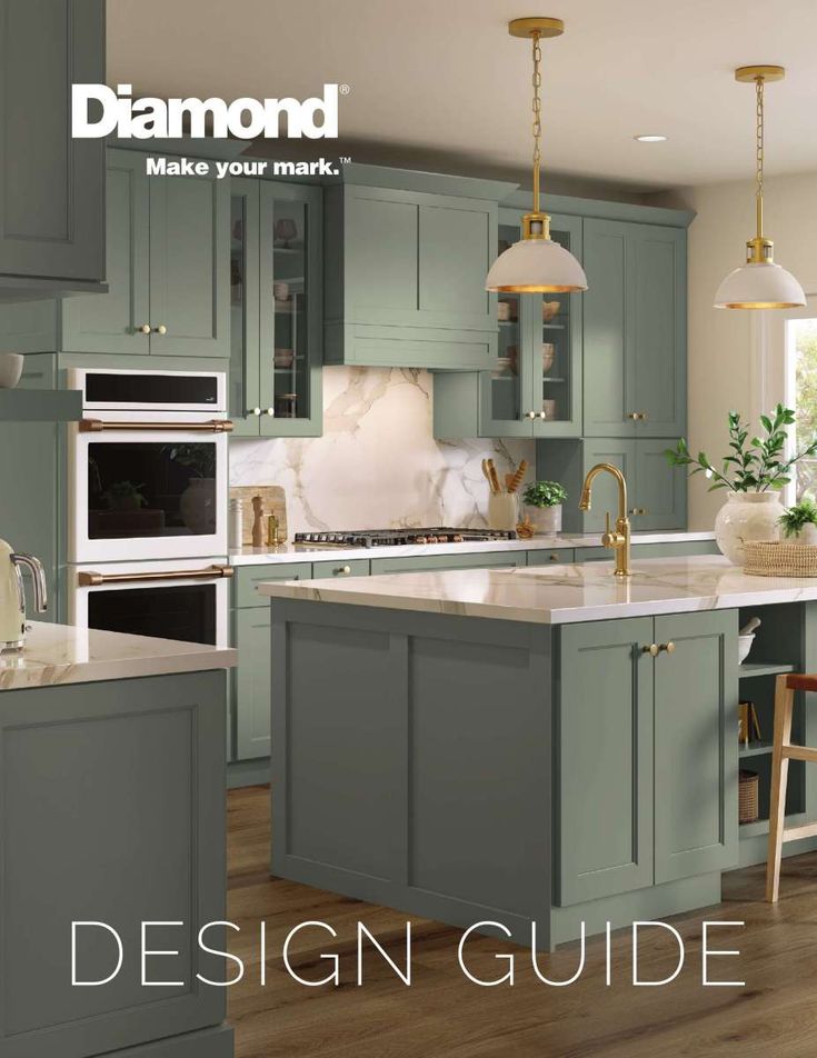 a kitchen with green cabinets and white counter tops