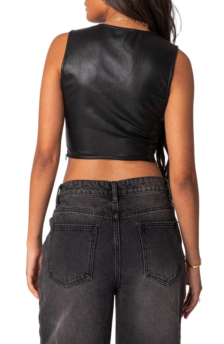 This bustier-inspired crop top is made of supple faux leather that brings edgy energy to your look. Square neck Sleeveless 100% polyurethane Hand wash, dry flat Imported Edgy Faux Leather Tops For Fall, Chic Leather Crop Top, Chic Cropped Crop Top With Zipper, Black Faux Leather Top For Club, Black Faux Leather Club Top, Fitted Leather Crop Top For Night Out, Cropped Zipper Closure Crop Top For Night Out, Cropped Crop Top With Zipper Closure For Night Out, Fitted Leather Crop Top