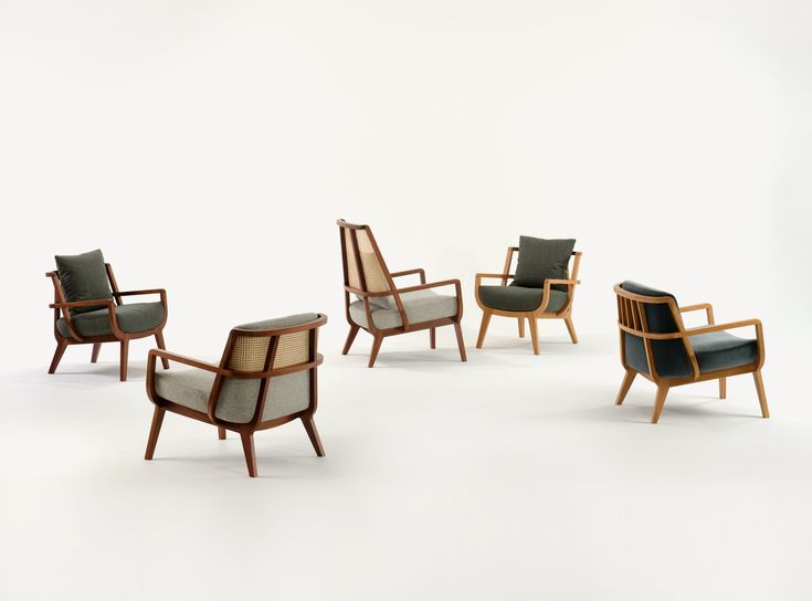 six chairs and one arm chair in various positions