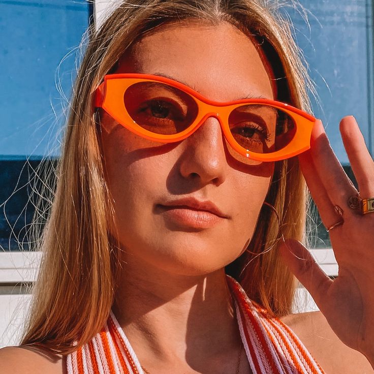 These Retro Fashion Sunglasses Are Such A Fun Touch To Any Outfit. Frames Are Bright Orange With Pink Arms And Light Orange Lenses. Comfortable Fit! Eye Size: 150mm Bridge Size: 20mm Frame Width: 70mm Frame Height 40mm Temple Length: 138mm Brand New! From My Boutique! Playful Sunglasses For Party, Trendy Orange Sunglasses For Spring, Summer Beach Cat Eye Sunglasses With Glass, Fun Orange Tinted Sunglasses, Retro Glass Cat Eye Sunglasses For The Beach, Retro Glass Cat Eye Sunglasses For Beach, Red Cat Eye Sunglasses For Beach, Orange Glass Sunglasses For Spring, Fun Orange Sunglasses For Summer