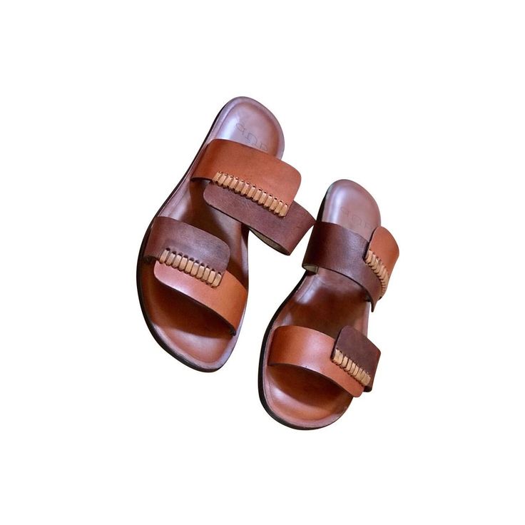 Leather sandals, produced by black owned Dakar Urban Brand. Made with sustainable materials. Produced under fair and equitable partnership with Senegal Artisans Artisan Sandals With Leather Sole For Summer, Brown Artisan Sandals For Summer, Artisan Brown Sandals For Summer, Artisan Open Toe Sandals In Natural Color, Artisan Leather Sandals For Spring, Casual Leather Flip Flops With Woven Sole, Brown Leather Slippers For Vacation, Adjustable Open Toe Brown Slippers, Brown Adjustable Open Toe Slippers