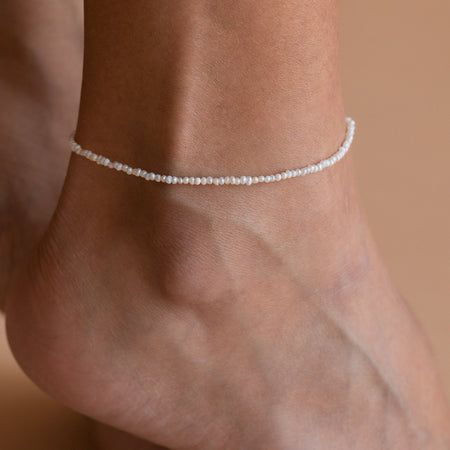 Brinley Dainty Pearl Anklet Summer Bracelets With Tiny Beads, Elegant Summer Pearl Bracelet For The Beach, Elegant Summer Pearl Bracelet For Beach, Summer Festival Bracelets, Handmade Adjustable Pearl Bracelet For Summer, Adjustable Pearl Bracelet For Summer Gifts, Adjustable Pearl Anklets For Summer, White Pearl Anklets For Summer, Bohemian Pearl Bracelet For Summer Gifts