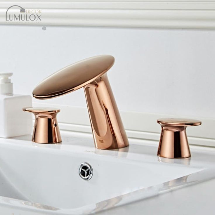 two faucets are shown in this bathroom sink