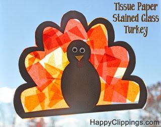 a turkey cut out with tissue paper sitting on top of it