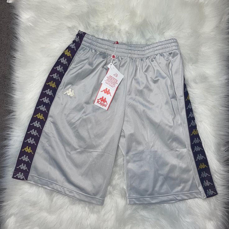 Product: Kappa Men’s Sliver Shorts Size: Xl Dm Best Offer Bin: $69 Casual Silver Bottoms For Streetwear, Casual Silver Short Bottoms, Sweat Shorts Men, Black Athletic Shorts, Clothes Men, Soccer Shorts, Shield Logo, Track Shorts, Retro Men