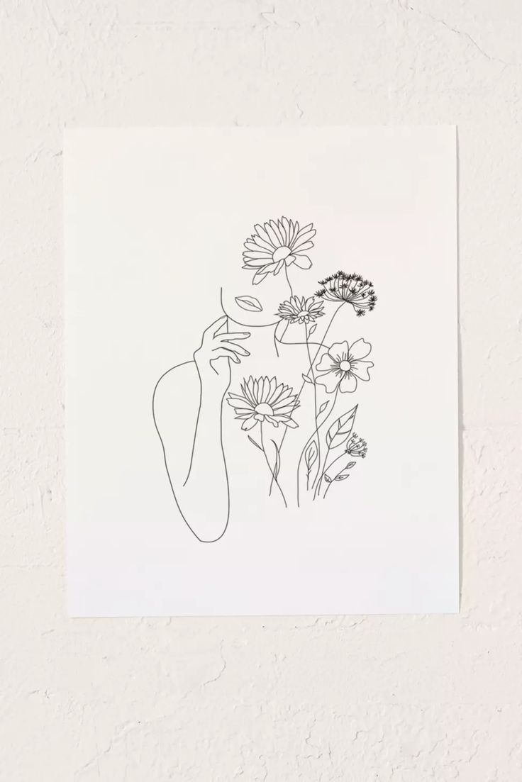 a black and white drawing of some flowers