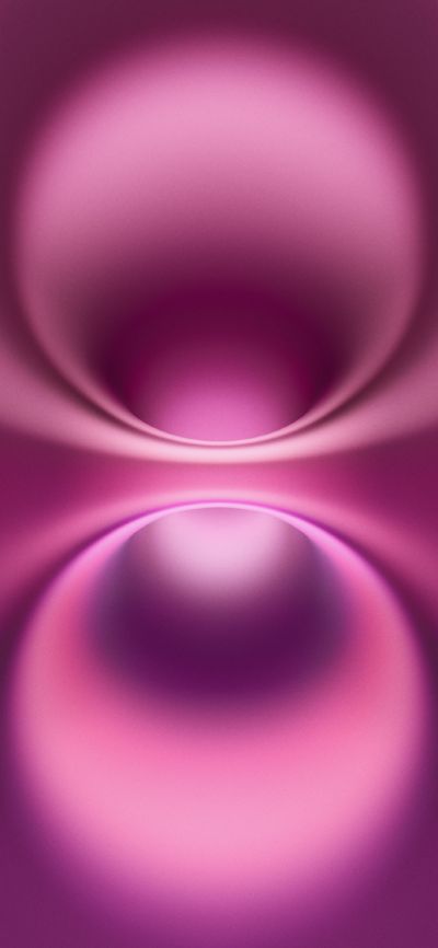 an abstract pink and purple background with circular shapes in the center, as well as some light