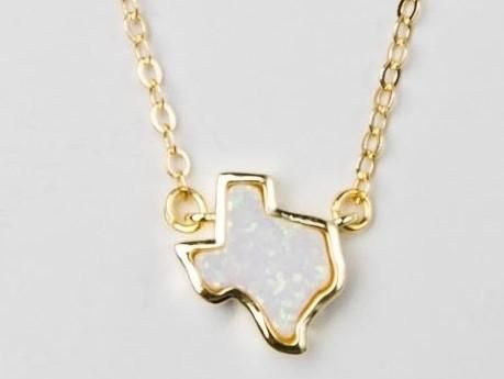 The Texas Opal Necklace combines two of our favorite things, Texas and Opal. The natural stone gives a bit of sparkle to this handmade adjustable 18K gold plated necklace. Makes a statement with other dainty pieces stacked to glow along with the fiery opal necklace. Perfect for your favorite Texan. Pairs well with the Texas Opal Bracelet, or continue the stack with the dainty Opal Necklace. Handmade in Houston, TX USA 18K gold plated Due to the one of a kind nature of the stone, each piece is un Gold Opal Charm Necklace As Gift, Minimalist Gold Opal Necklace, Adjustable Gold Opal Jewelry, Adjustable Gold Charm Necklace With Gemstone, Handmade Gold Opal Necklaces, Handmade Opal Gold Necklace, Handmade Gold Opal Necklace, Dainty Adjustable Opal Necklace, Dainty Opal Adjustable Necklace