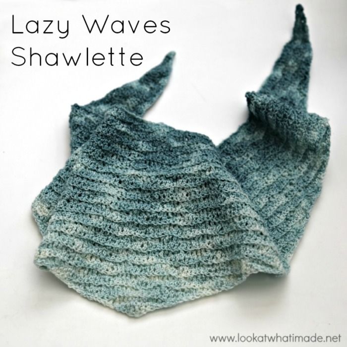 a close up of a knitted mitt on a white surface with text that reads lazy waves shawlette