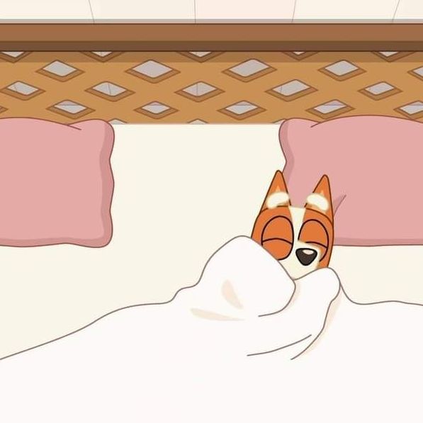 a cartoon dog is sleeping under the covers on a bed with pink sheets and pillows