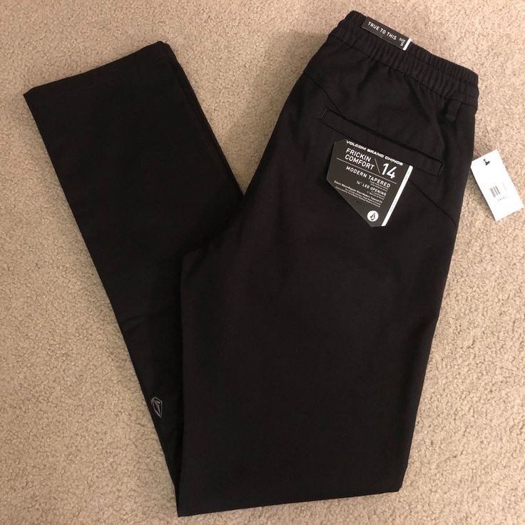 Volcom Frickin Comfort Chino Pants Brand New With Tags! Black Small Elastic Waist Black Straight Leg Pull-on Bottoms, Black Straight Leg Pull-on Pants, Urban Full-length Bottoms For Workwear, Black Straight Pants With Pull-on Style, Urban Style Full Length Bottoms For Work, Black Casual Cargo Pants With Welt Pockets, Urban Tapered Leg Bottoms For Workwear, Casual Black Chinos With Welt Pockets, Casual Black Work Pants With Elastic Waistband