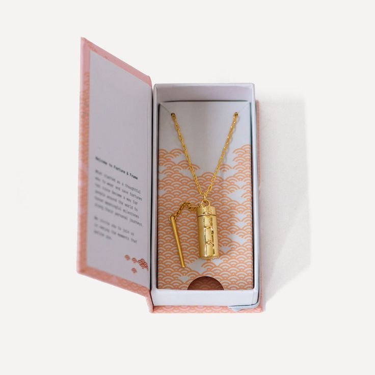 Our Capsule + Wand Locket is inspired by vintage poison jewelry. Capsule necklaces open to reveal your note or secret intention, rolled into a scroll. Dimensional Wall Decor, Gold Glam, Mini Envelopes, Paper Gift Bags, Tea Service, Fountain Pen Ink, Stationery Pens, Locket Necklace, Gold Plated Silver