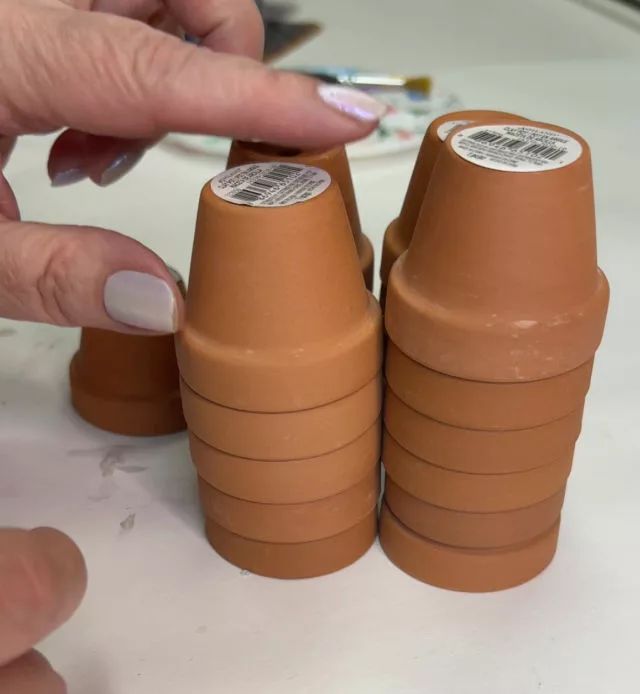 someone is making clay cones out of clay