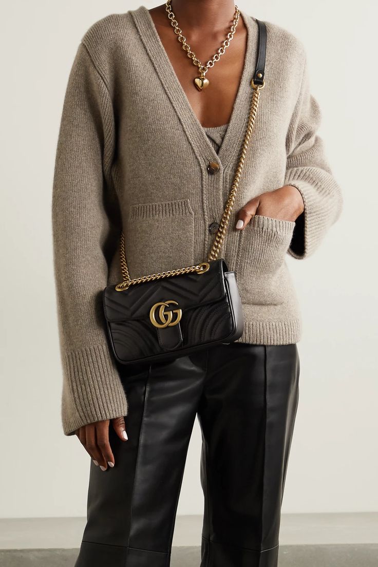 Black GG Marmont quilted leather shoulder bag | GUCCI | NET-A-PORTER Gucci Bag Outfit, Gucci Marmont Mini, Gg Marmont Bag, Gucci Marmont Bag, Gucci Crossbody Bag, Gucci Purse, Gucci Crossbody, Gucci Outfits, Gucci Gg Marmont